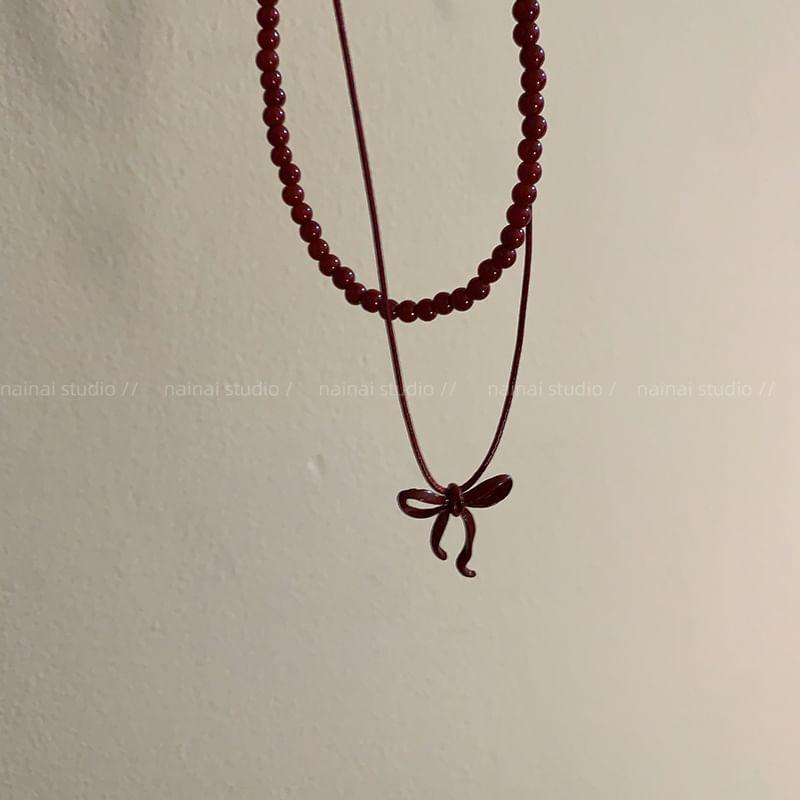 Bow Pendant Layered Bead Choker Product Image