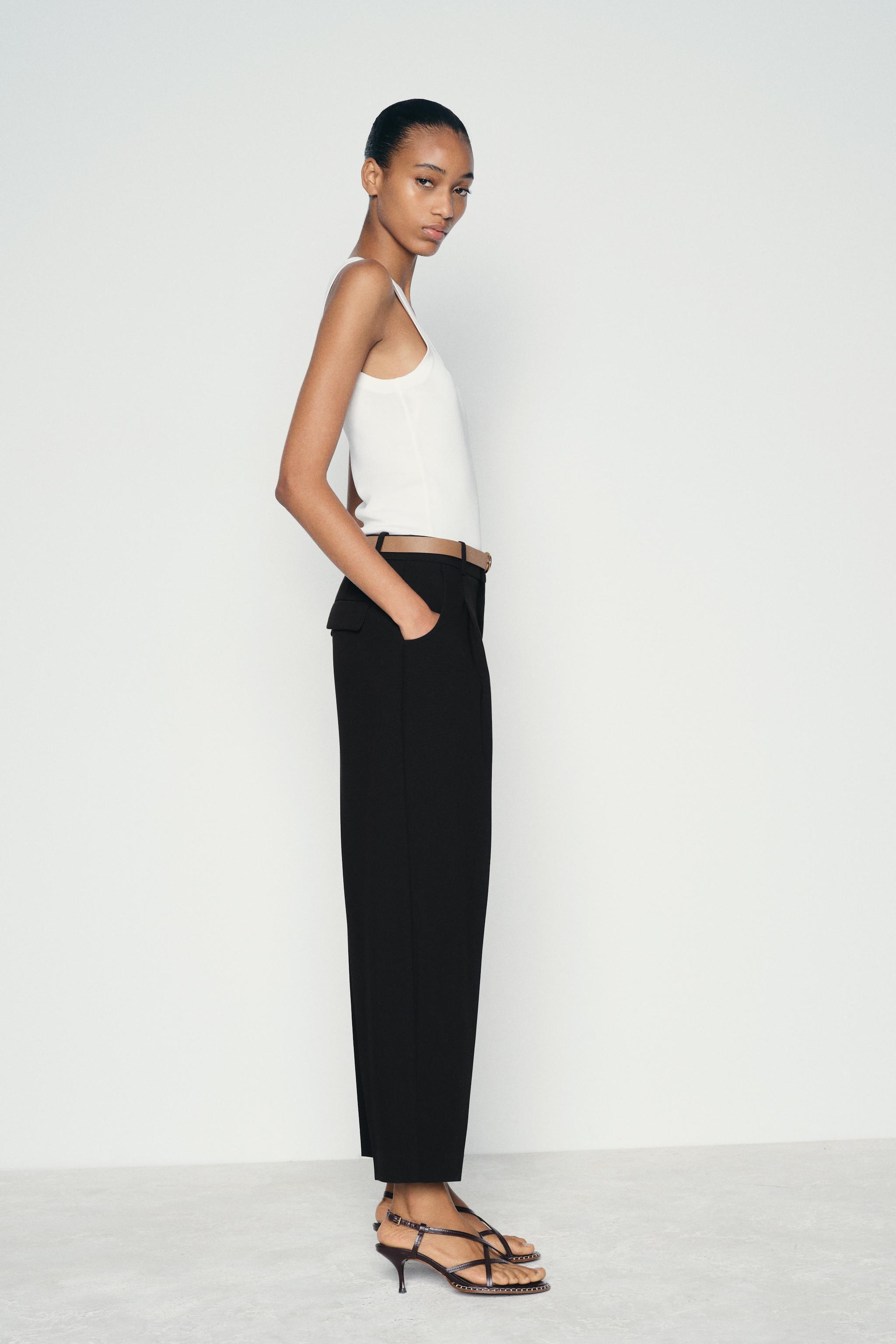 PLEATED PANTS WITH BELT Product Image