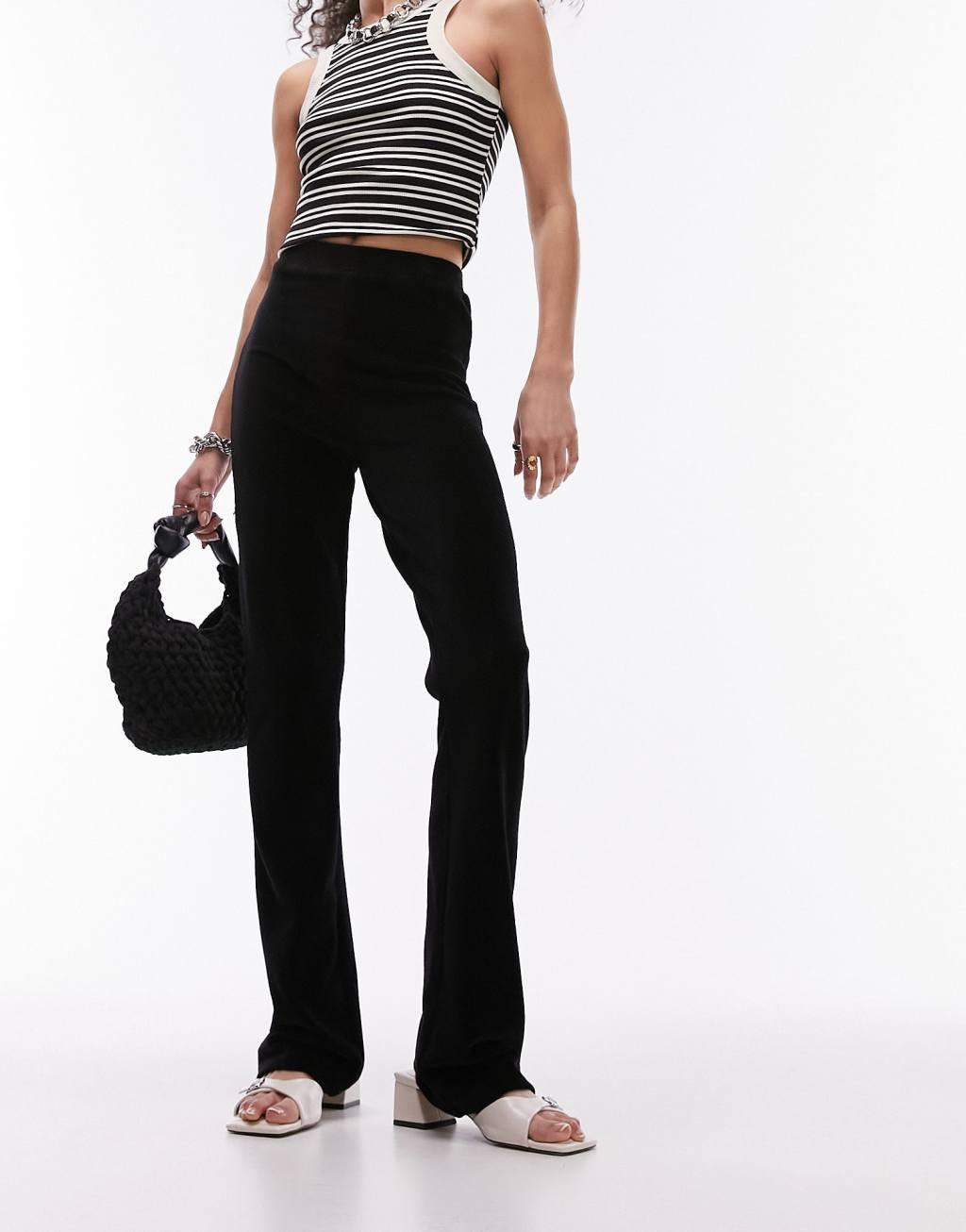 Topshop stretchy cord flared pants in black Product Image