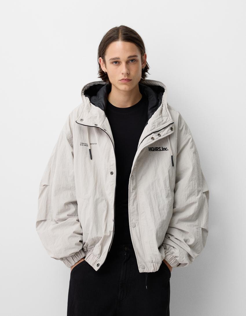 Hooded quilted technical jacket Product Image