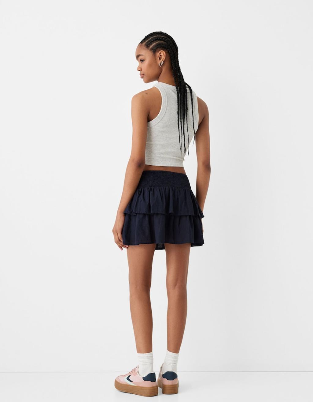 Bershka shirred waist rara mini skirt in navy Product Image