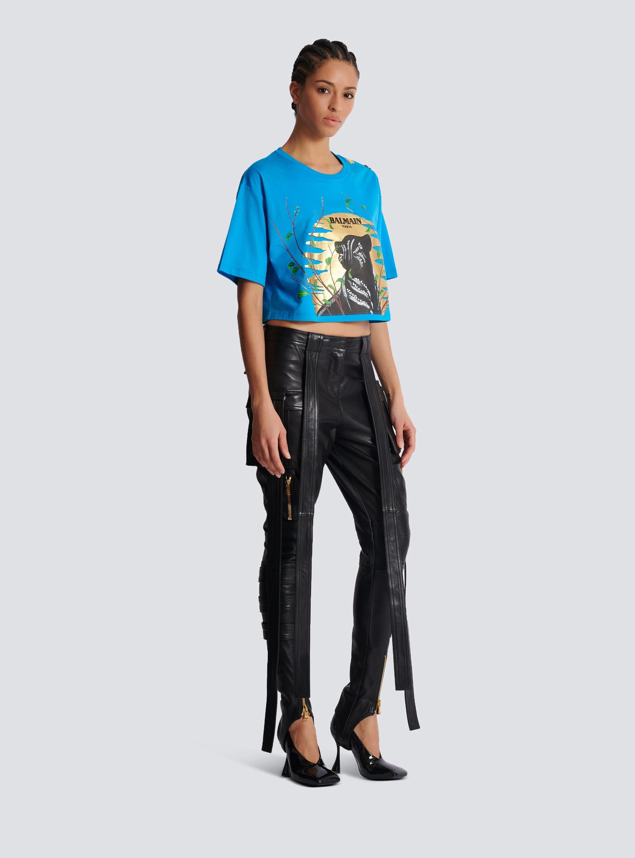 Leather cargo trousers with straps Product Image