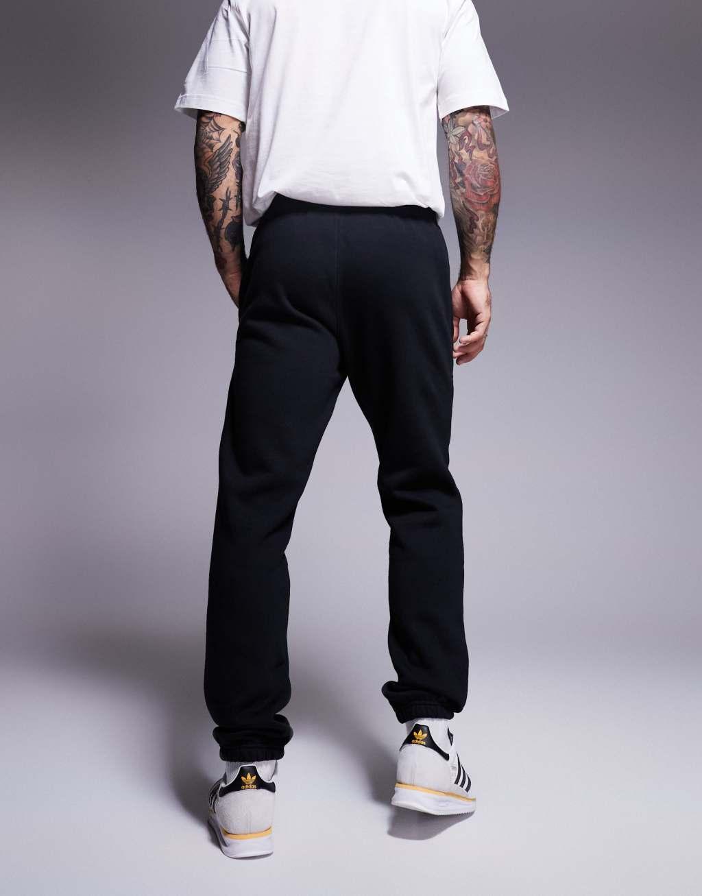 adidas Originals essential track pants in black Product Image