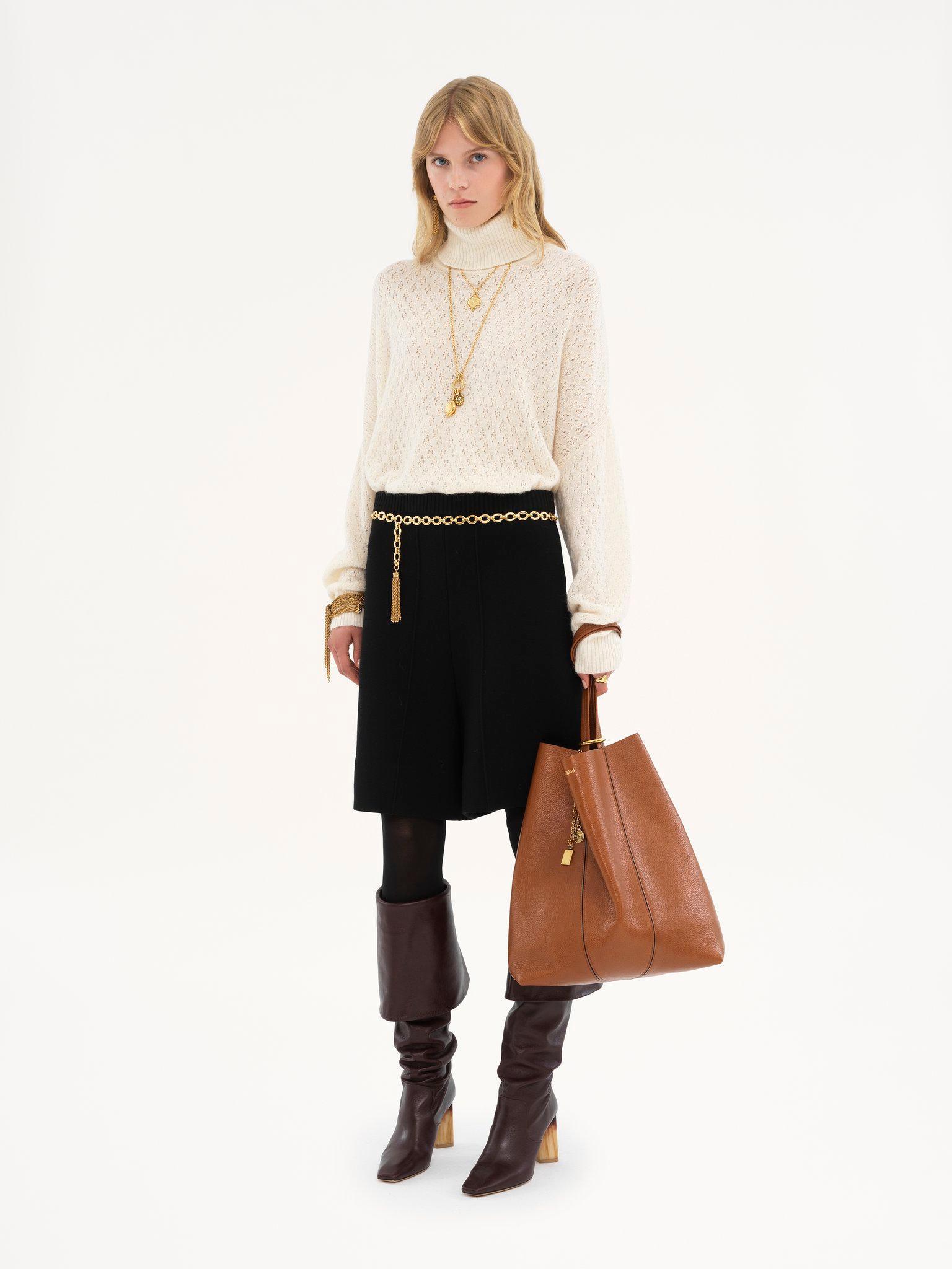 Generous turtleneck sweater in pointelle knit Product Image