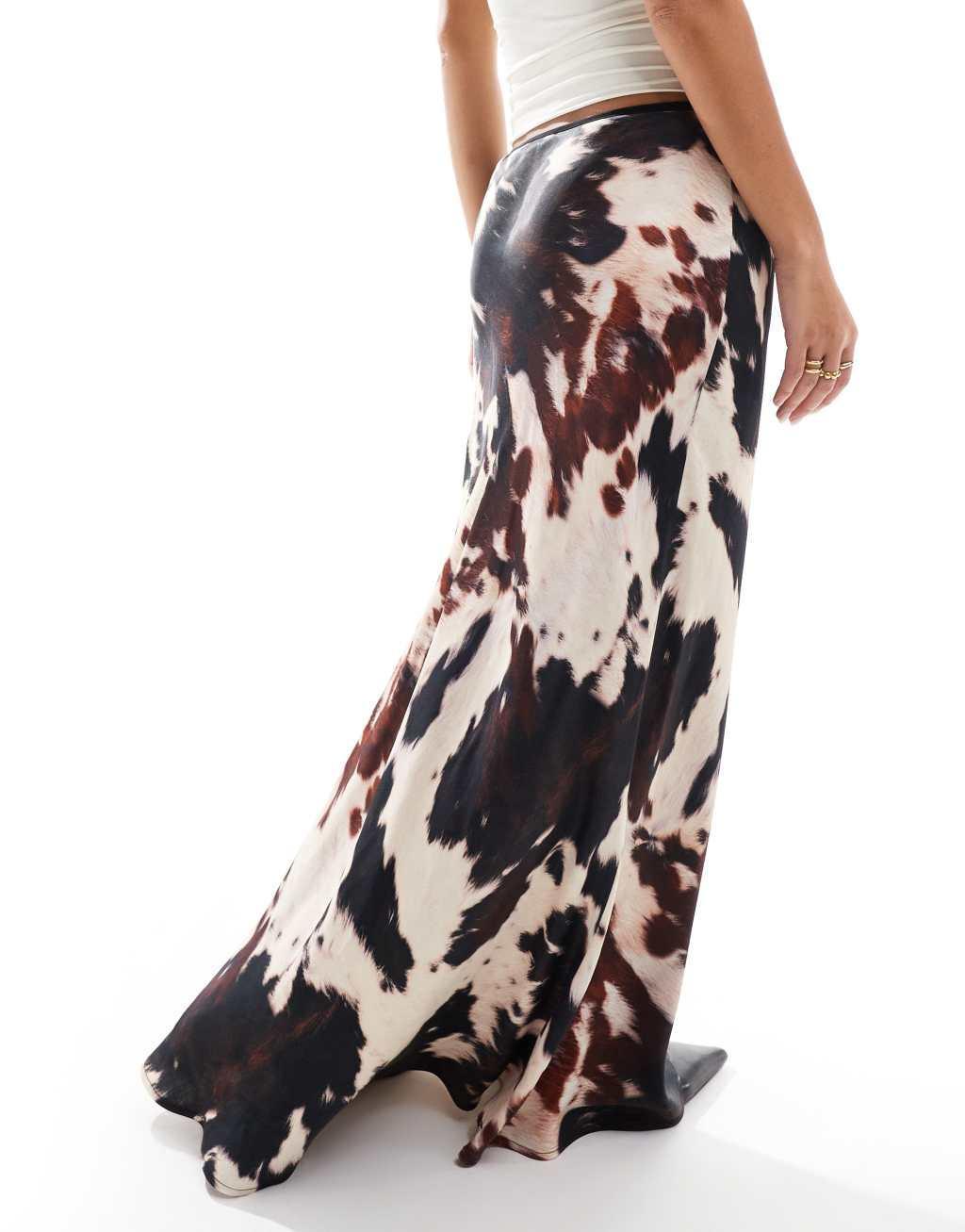 ASOS DESIGN satin bias maxi skirt in cow print Product Image