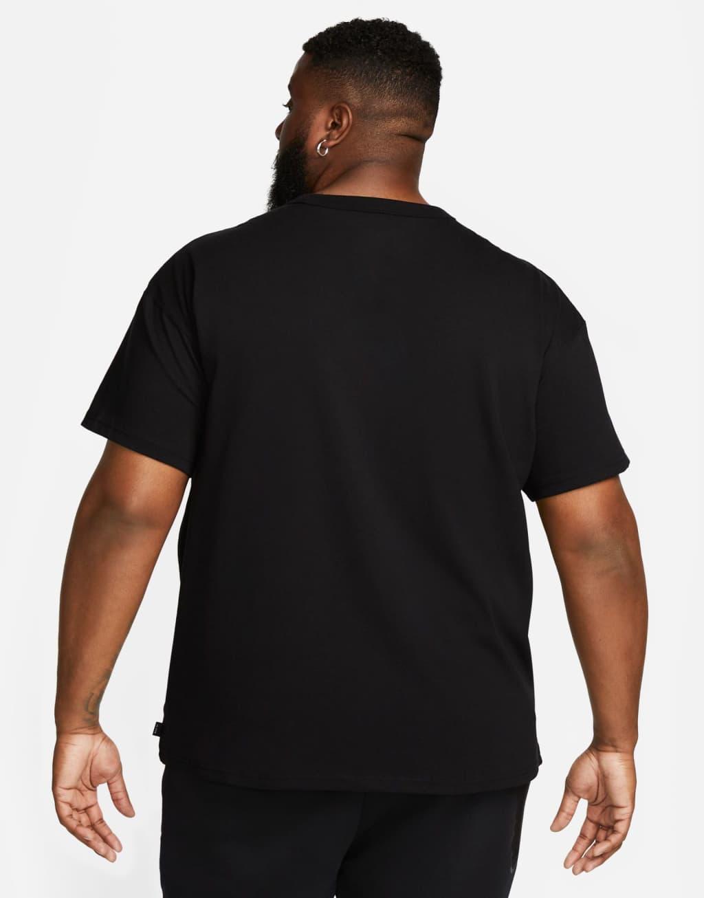 Nike Premium Essentials unisex oversized T-shirt in black Product Image