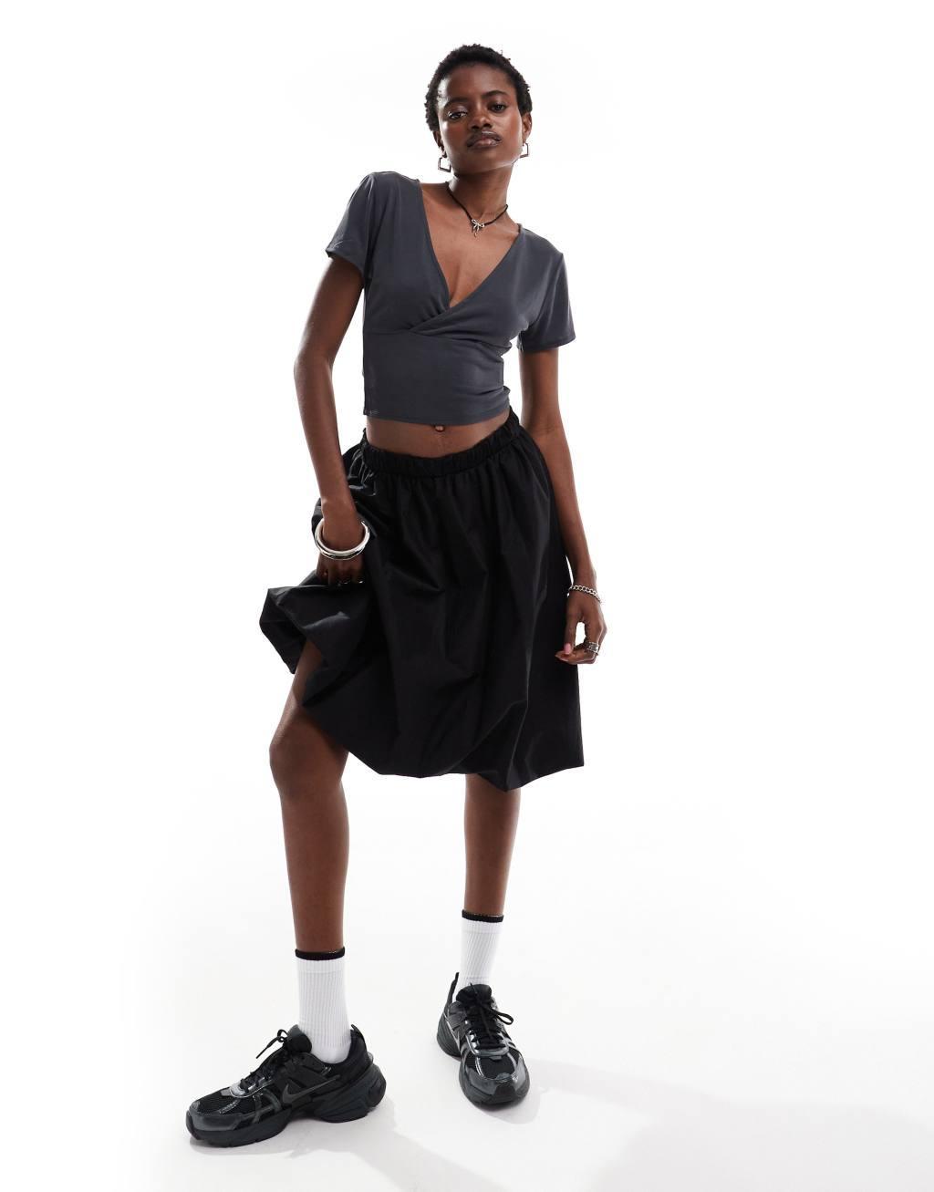 Monki super soft cropped short sleeve top with wrap front detail in black Product Image