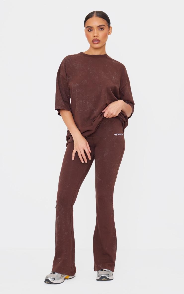 PRETTYLITTLETHING Chocolate Print Washed High Waist Flared Pants Product Image