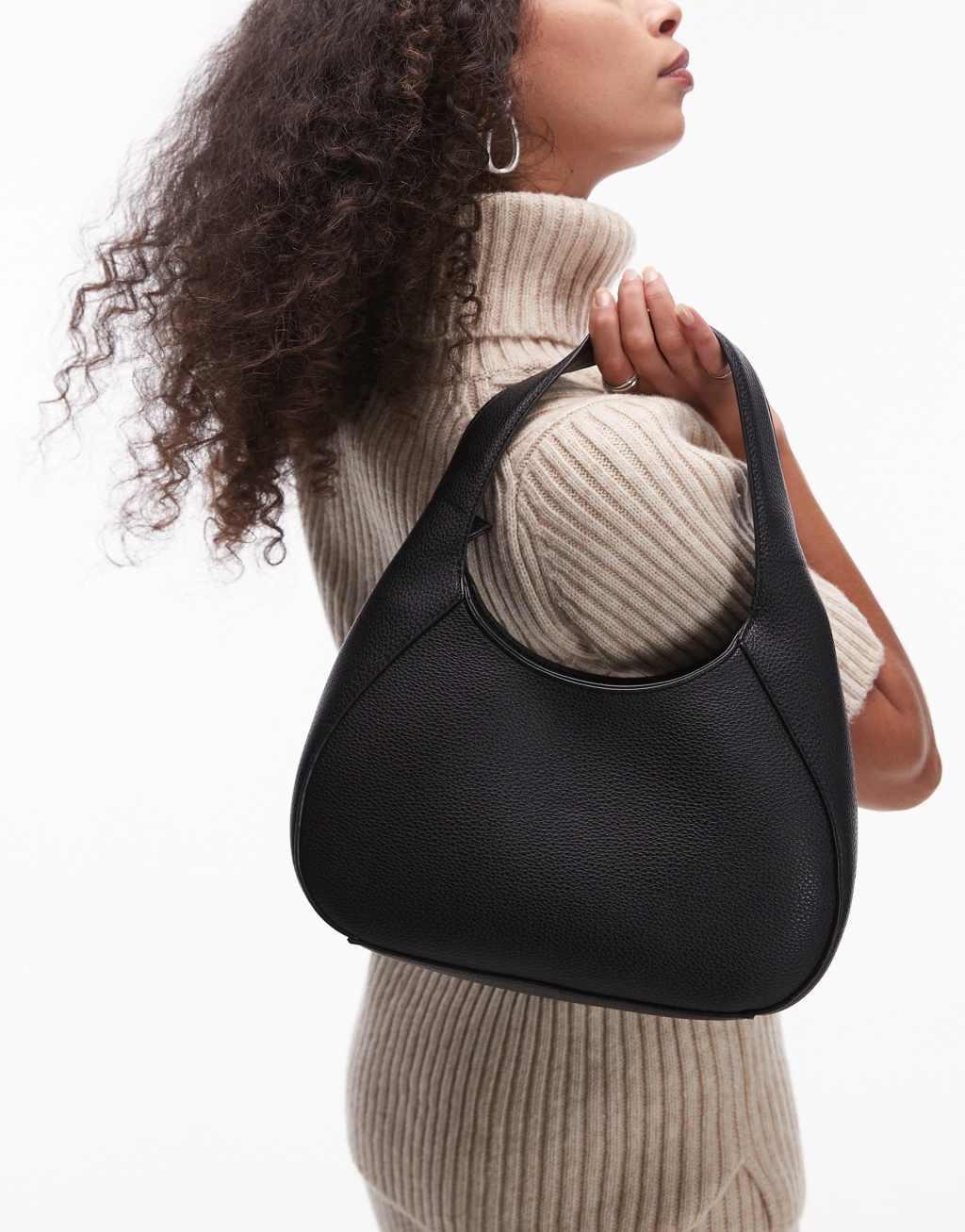 Mango rounded shoulder bag in black Product Image