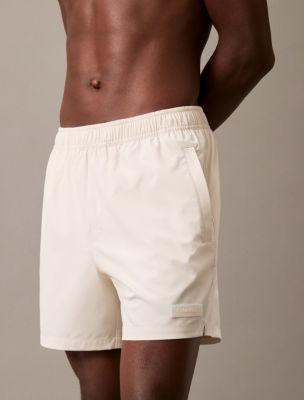 Logo Badge Solid Swim Shorts Product Image