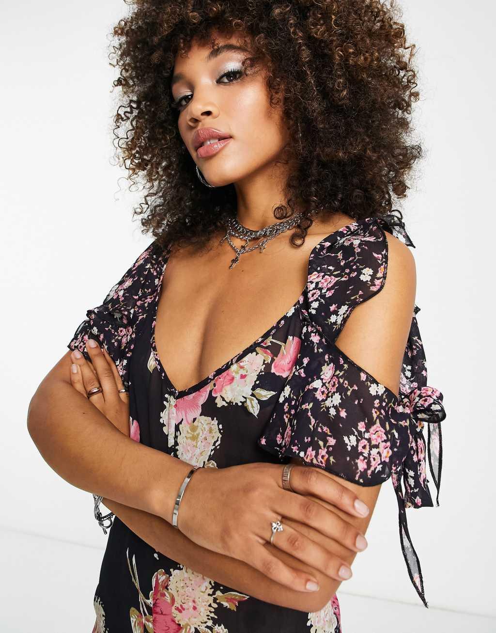 ASOS DESIGN ruffle sleeve jumpsuit in vintage floral  Product Image