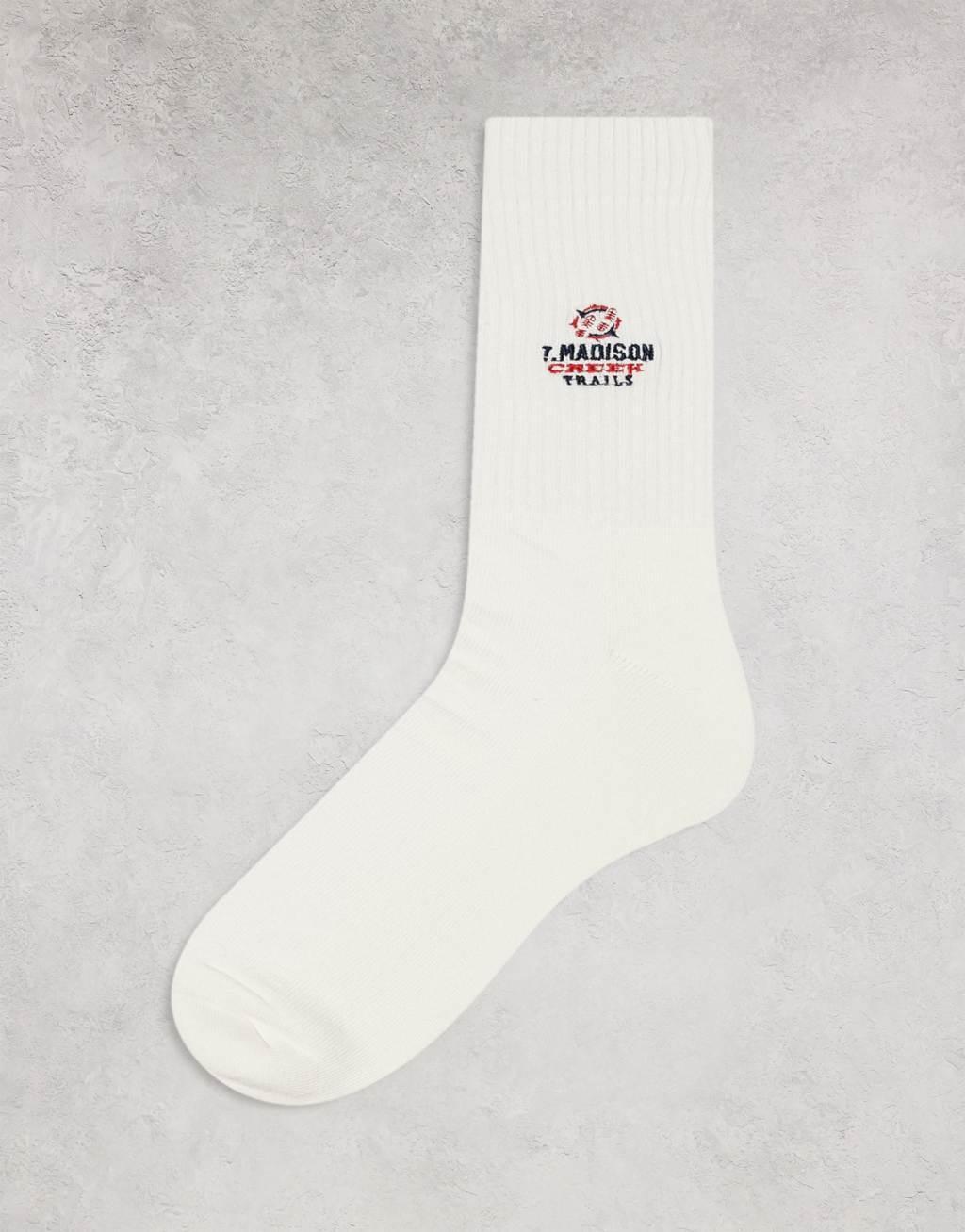 ASOS DESIGN sport sock with badge artwork in cream Product Image