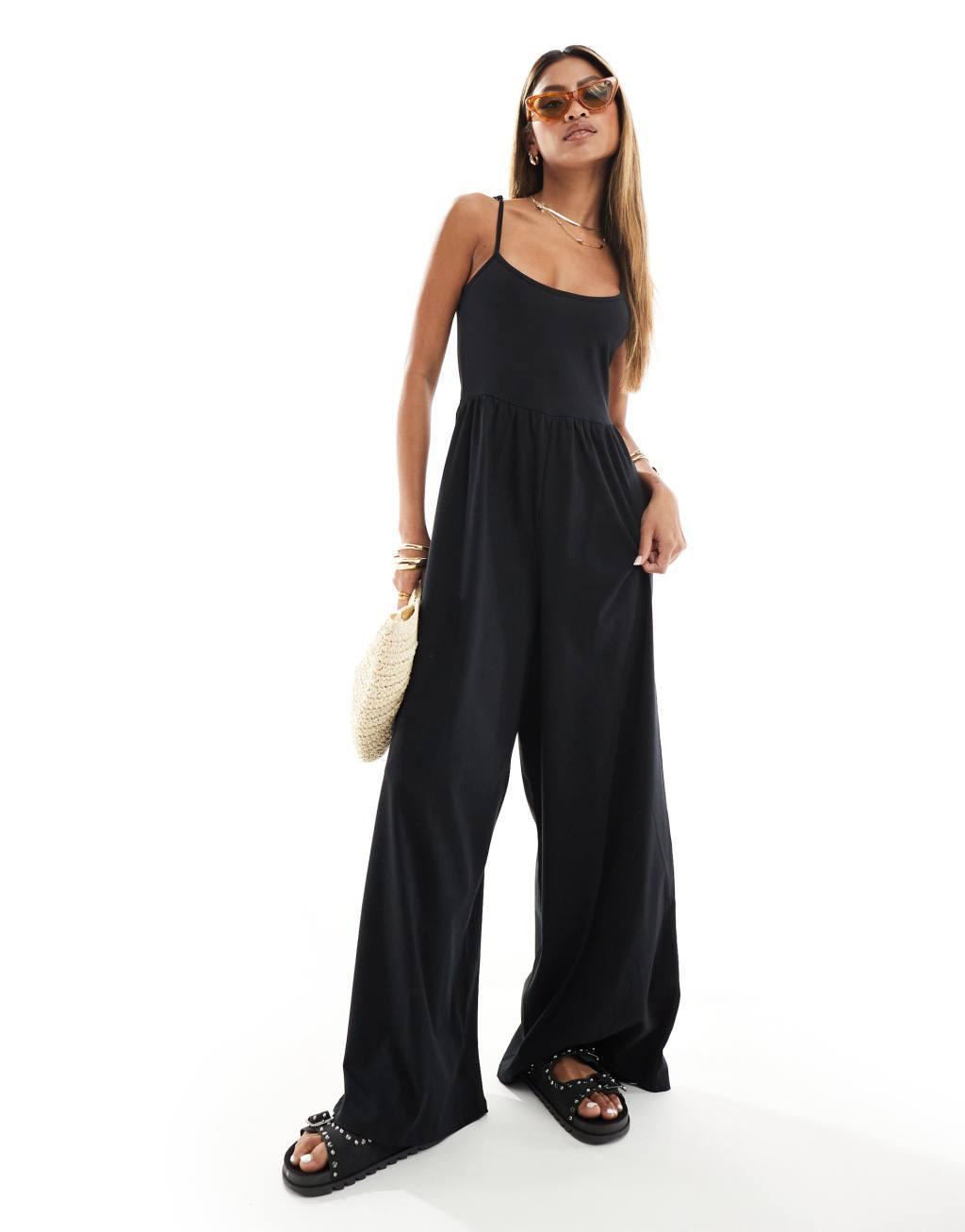 ASOS DESIGN scoop neck strappy wide leg jumpsuit in black Product Image