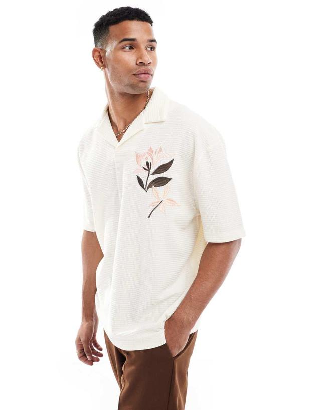 ASOS DESIGN oversized button through texture polo with embroidery Product Image