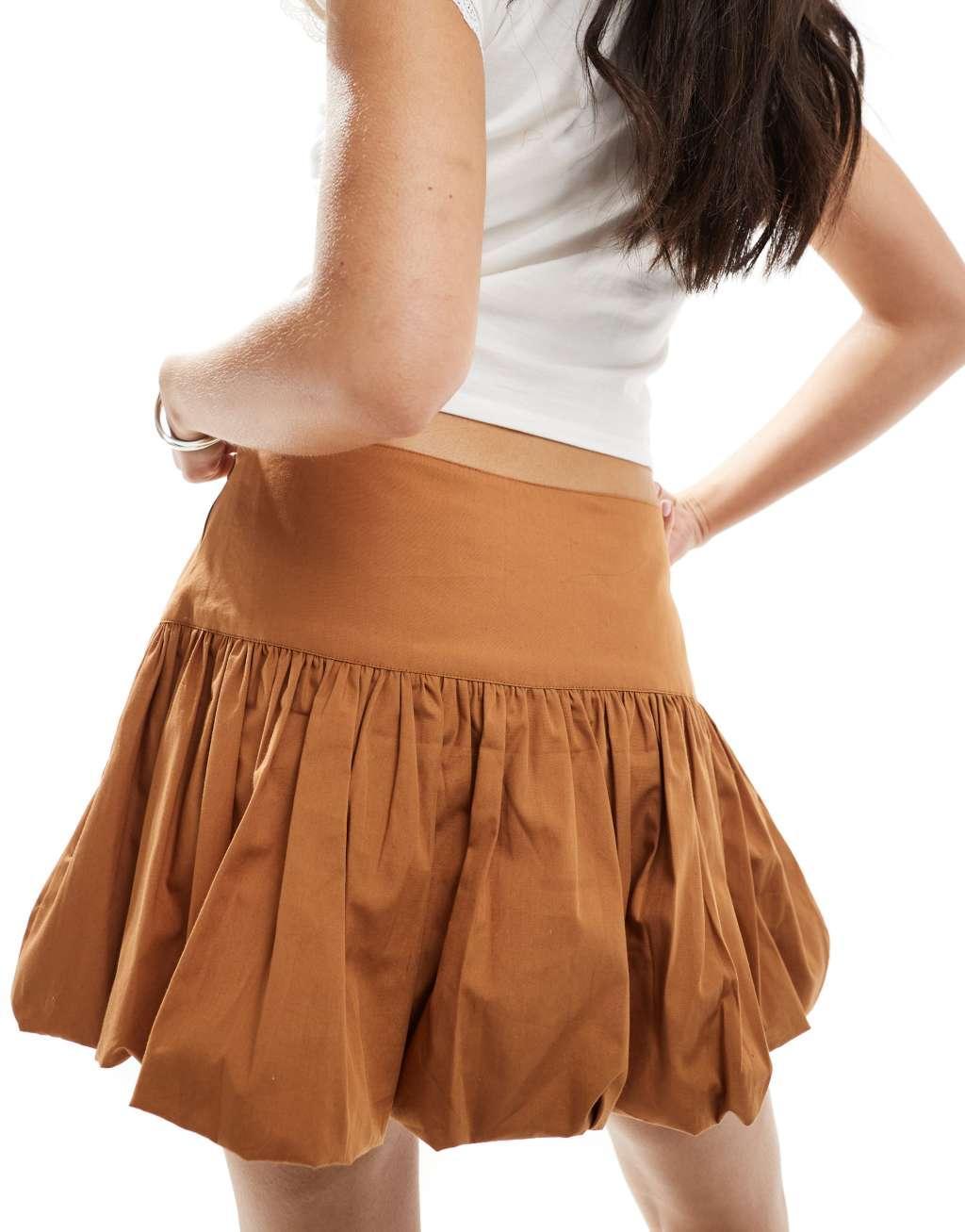 ASOS DESIGN drop waist bubble mini skirt in mustard Product Image