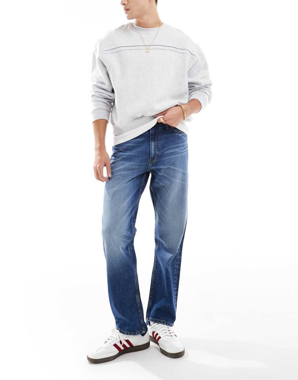 ASOS DESIGN straight stretch jeans in mid blue wash Product Image