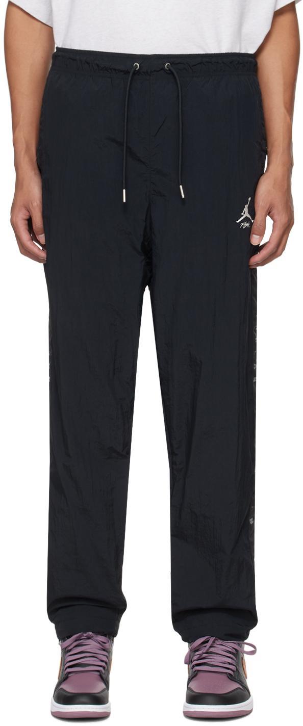 Black Essentials Track Pants In Black/sail Product Image