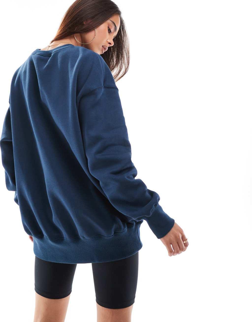 Nike Phoenix Fleece oversized sweatshirt in navy Product Image