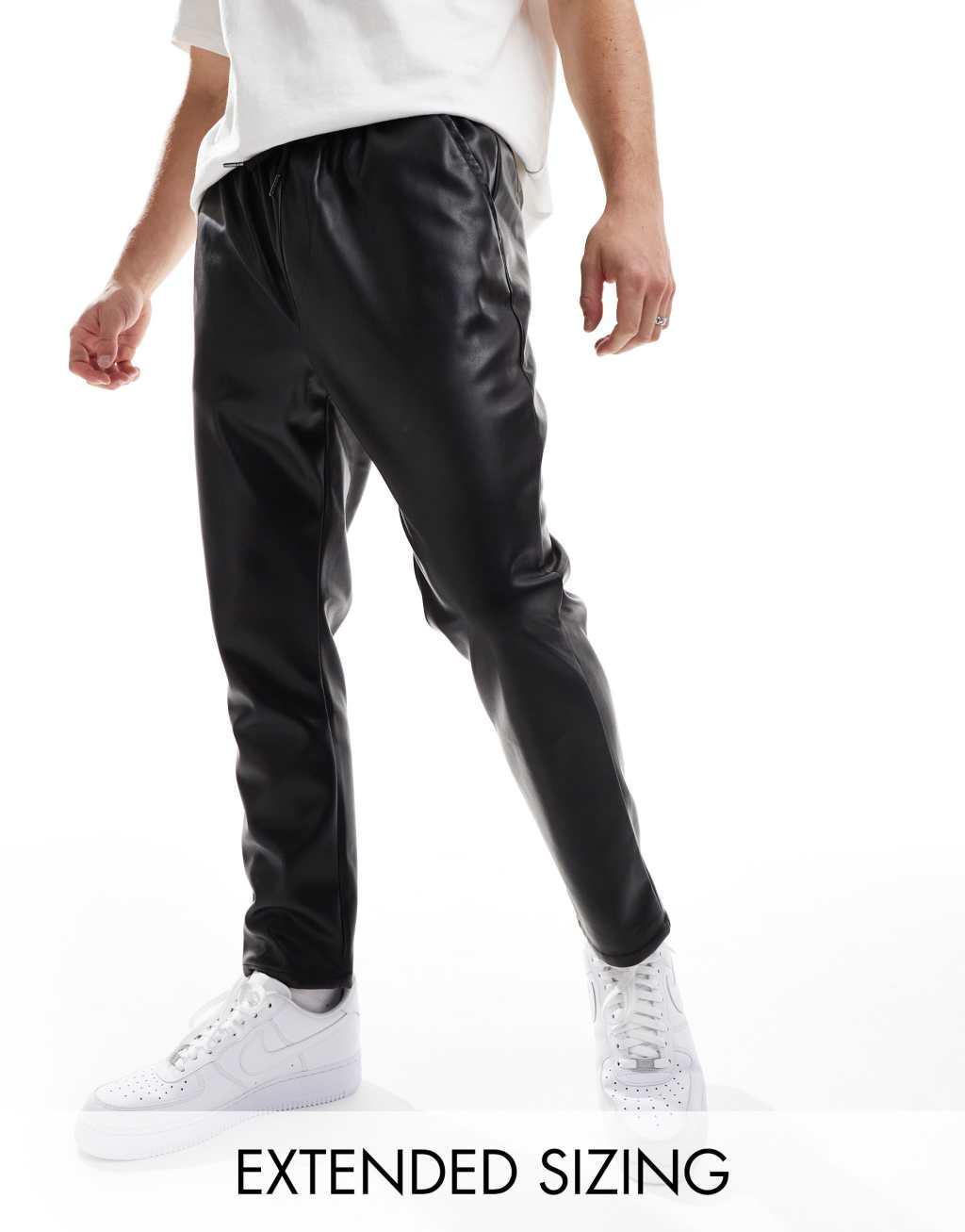 ASOS DESIGN leather look tapered pants in black Product Image