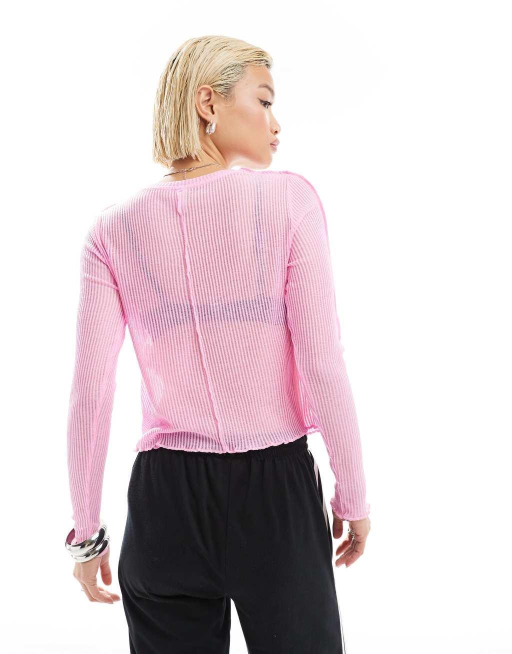 ONLY long sleeve lettuce hem sheer top in pink Product Image