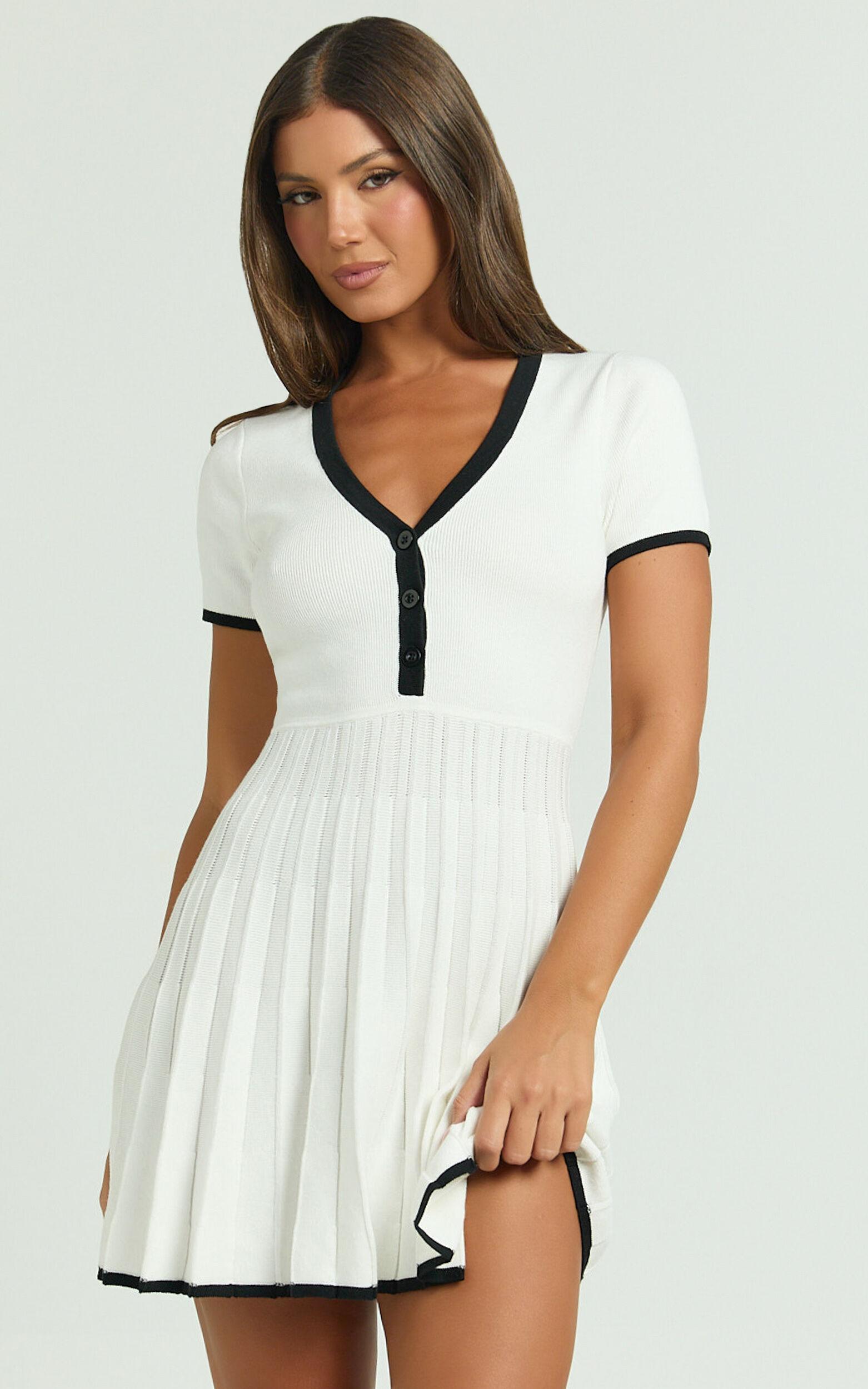 Vivienne Mini Dress - Short Sleeve Pleated Skirt Knitted Dress in Cream Product Image