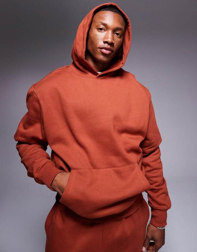 ASOS DESIGN premium heavyweight oversized hoodie in burnt red - part of a set Product Image