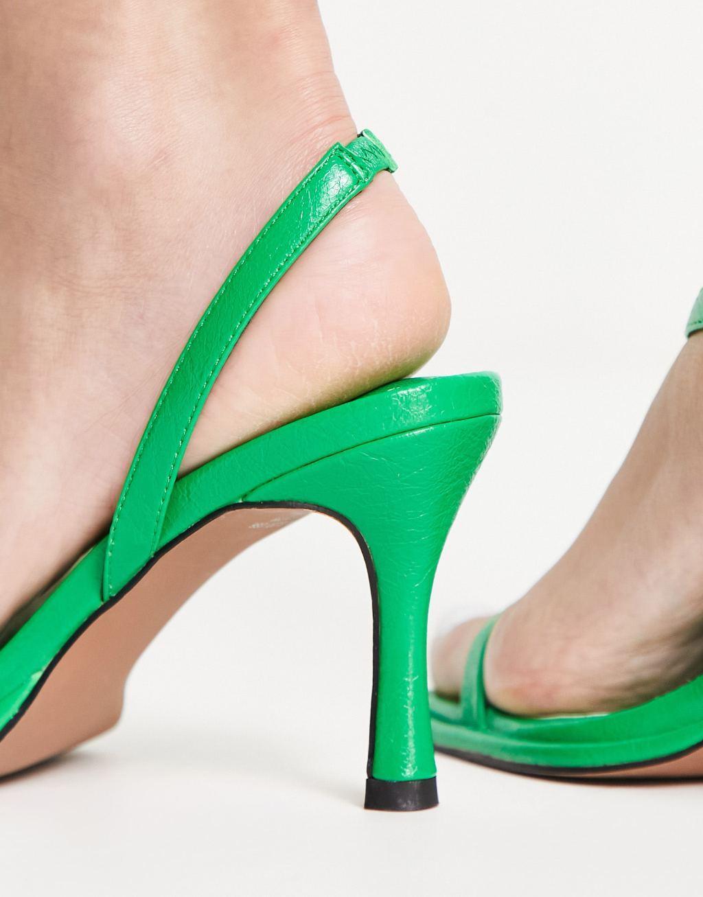 ASOS DESIGN Haya asymmetric mid heeled sandals in green Product Image