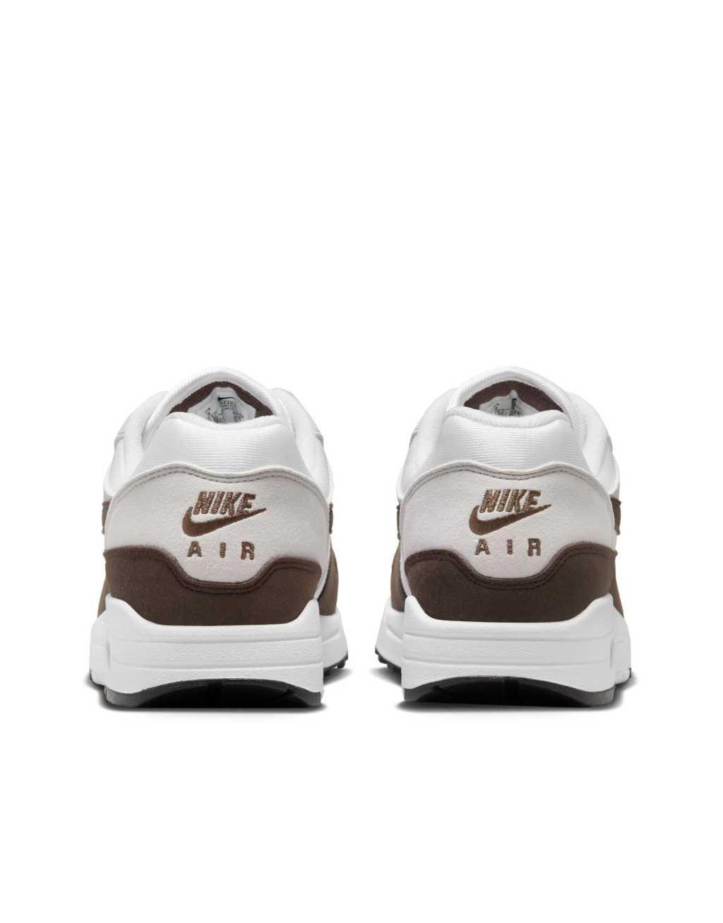 Nike Air Max 1 sneakers in white and dark brown  Product Image