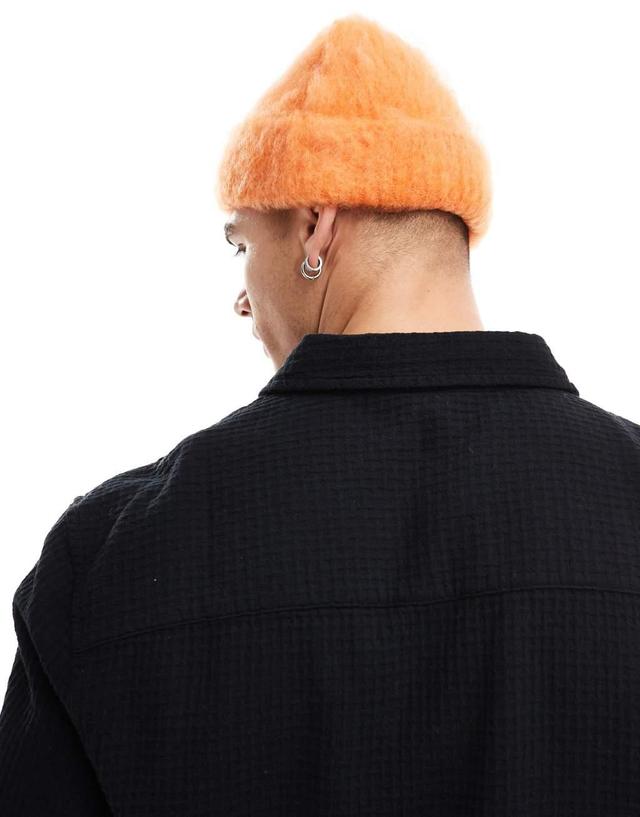 ASOS DESIGN fluffy wool mix beanie in orange Product Image