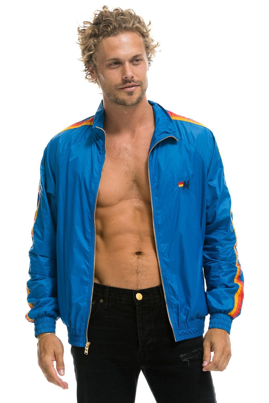 MEN'S 4 STRIPE WINDBREAKER -  SNORKEL BLUE Male Product Image