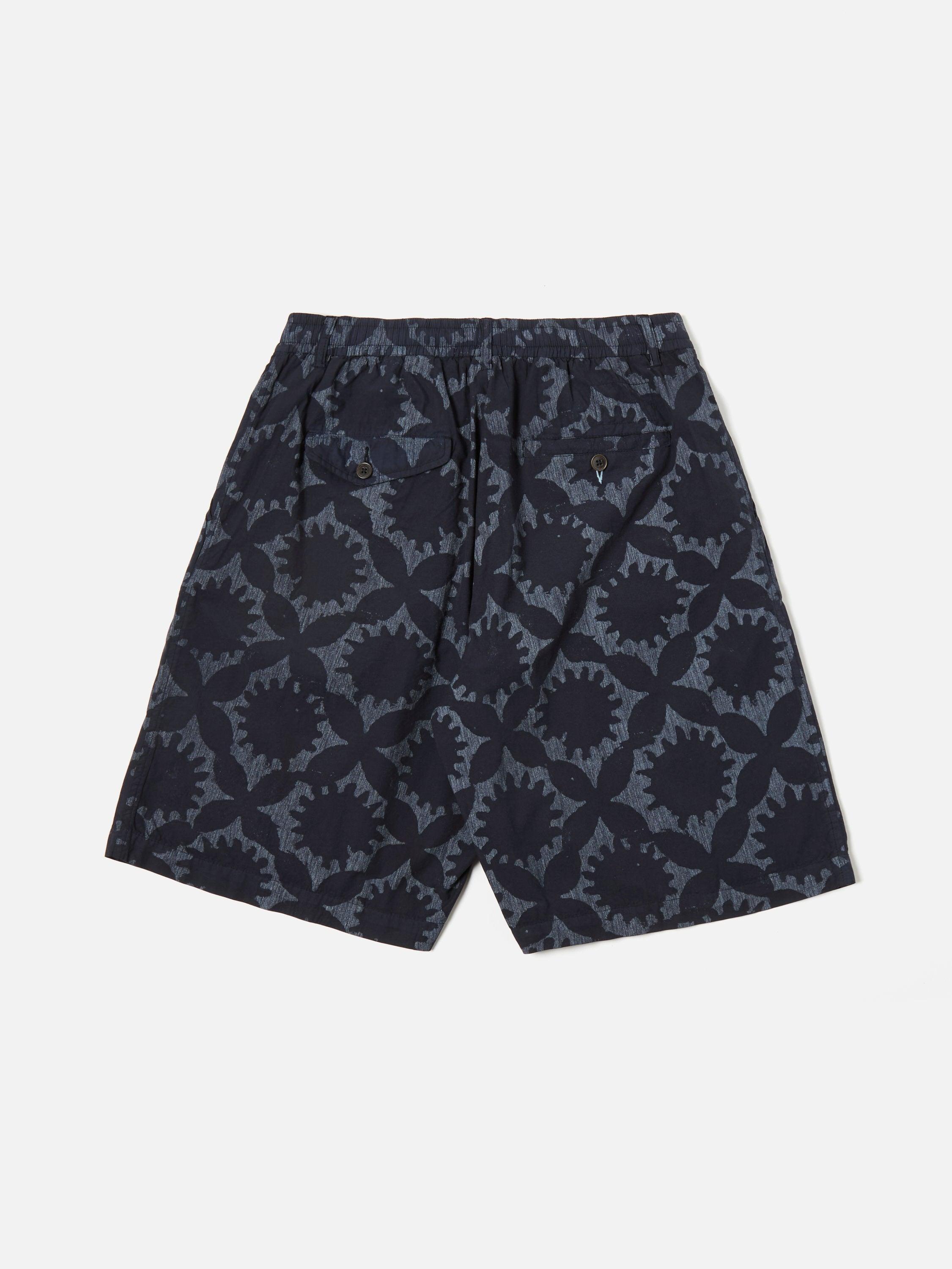 Universal Works Pleated Track Short in Navy Over Dyed Sun Print Product Image