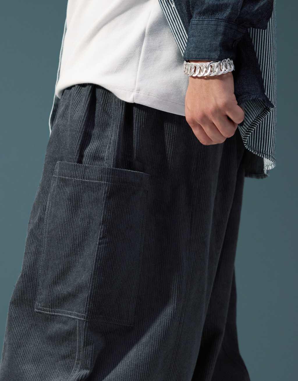 ASOS DESIGN oversized balloon cord pants in charcoal with side pockets Product Image