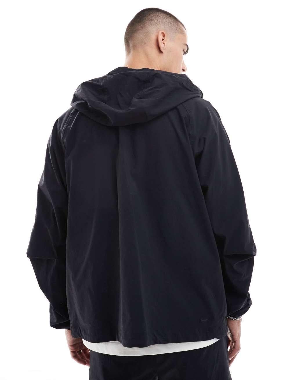 Nike Tech Woven full zip hoodie in black Product Image