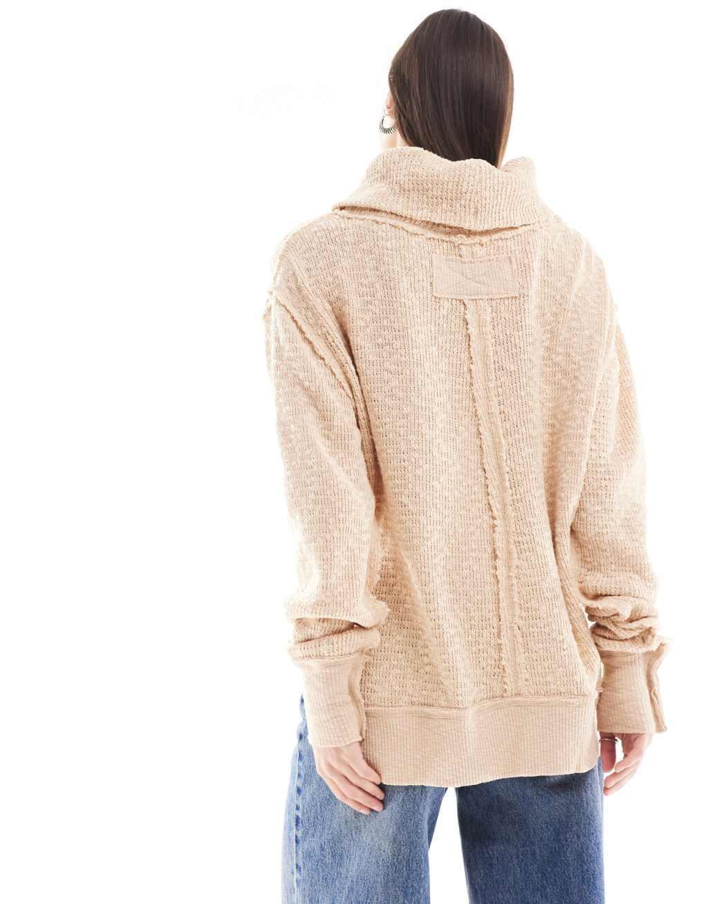 Free People roll neck slouchy sweater in camel Product Image