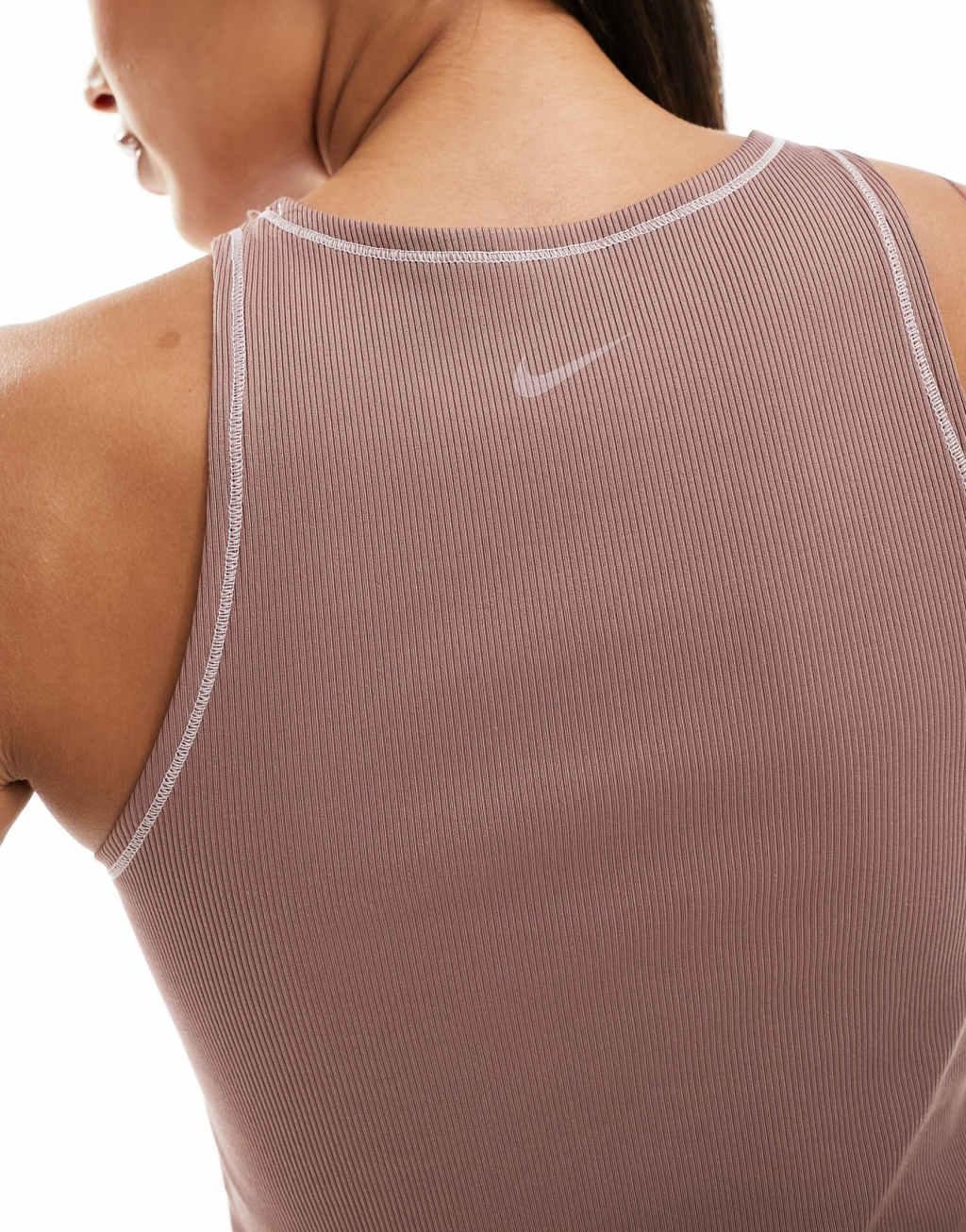 Nike One Training Dri-Fit stitch detail ribbed tank top in purple  Product Image