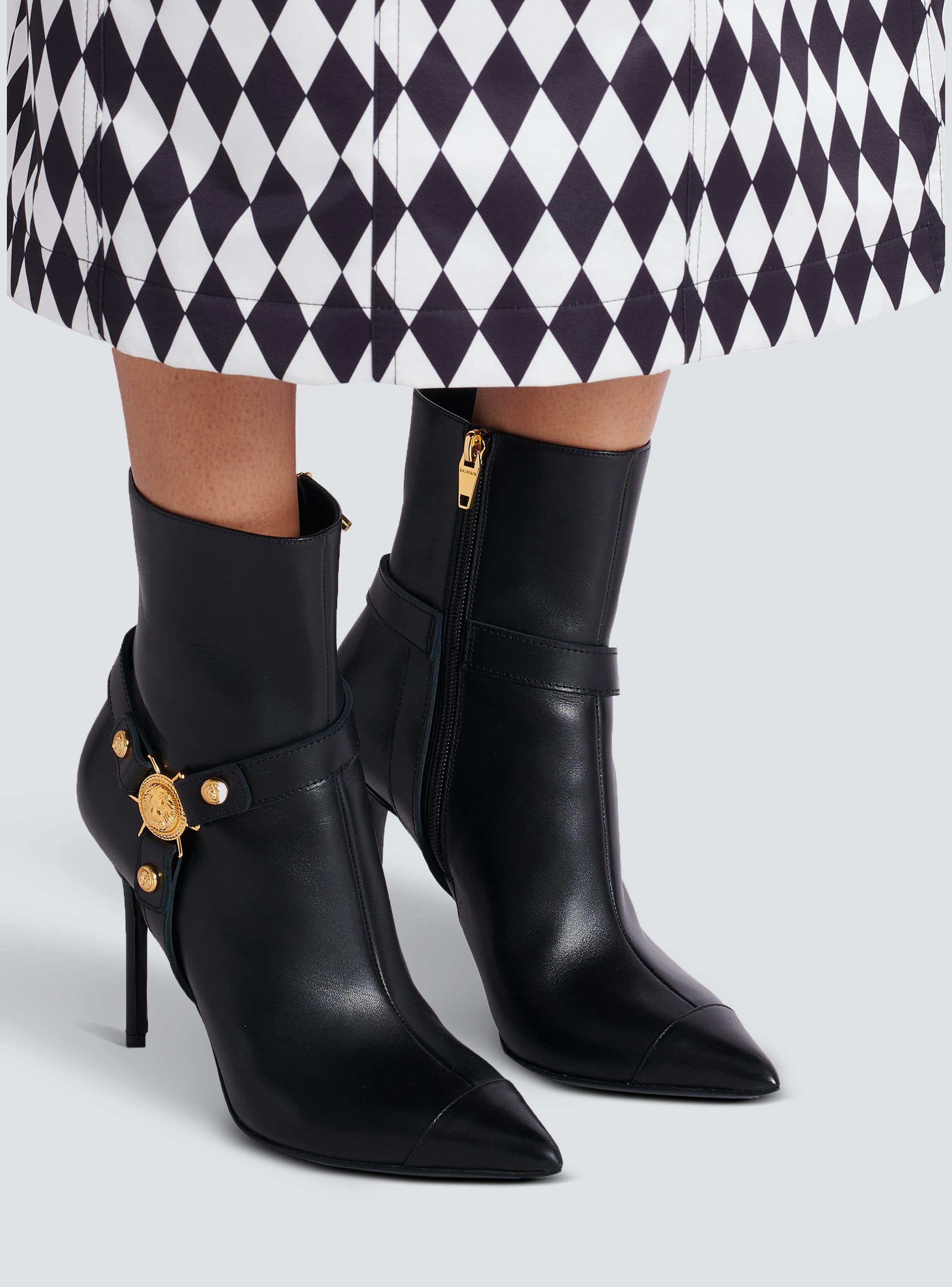 Heeled calfskin Eva ankle boots Product Image