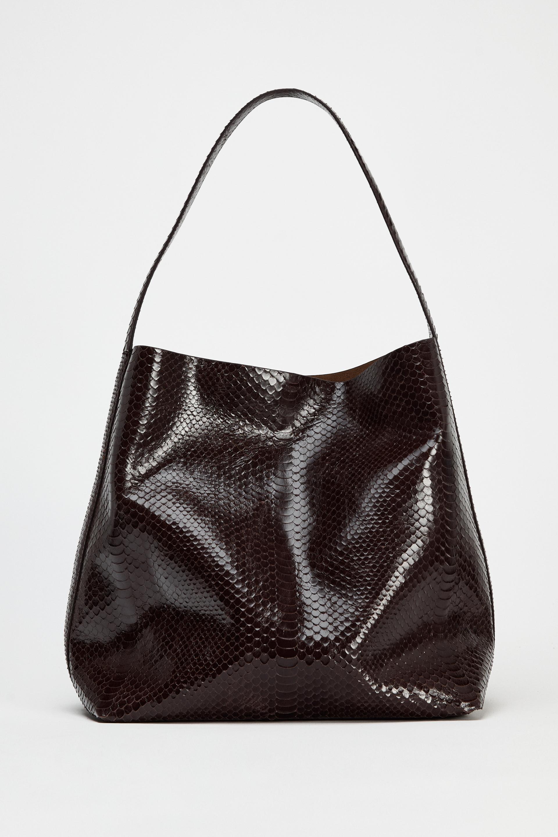 EMBOSSED LEATHER MAXI BUCKET BAG Product Image