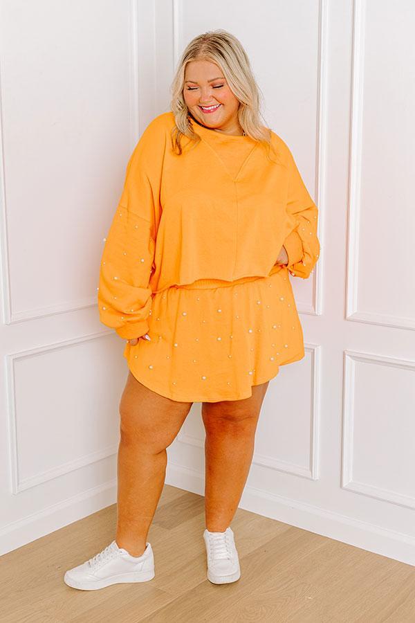 Sideline Chic Pearl Embellished Crop Sweatshirt in Orange Curves Product Image