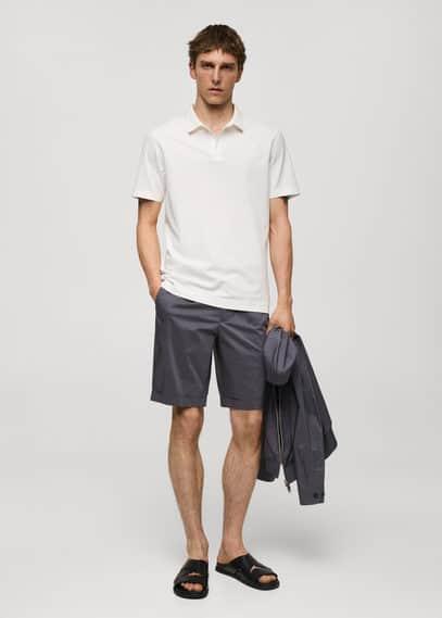 Slim-fit cotton-piqué polo shirt - Men | MANGO USA Product Image