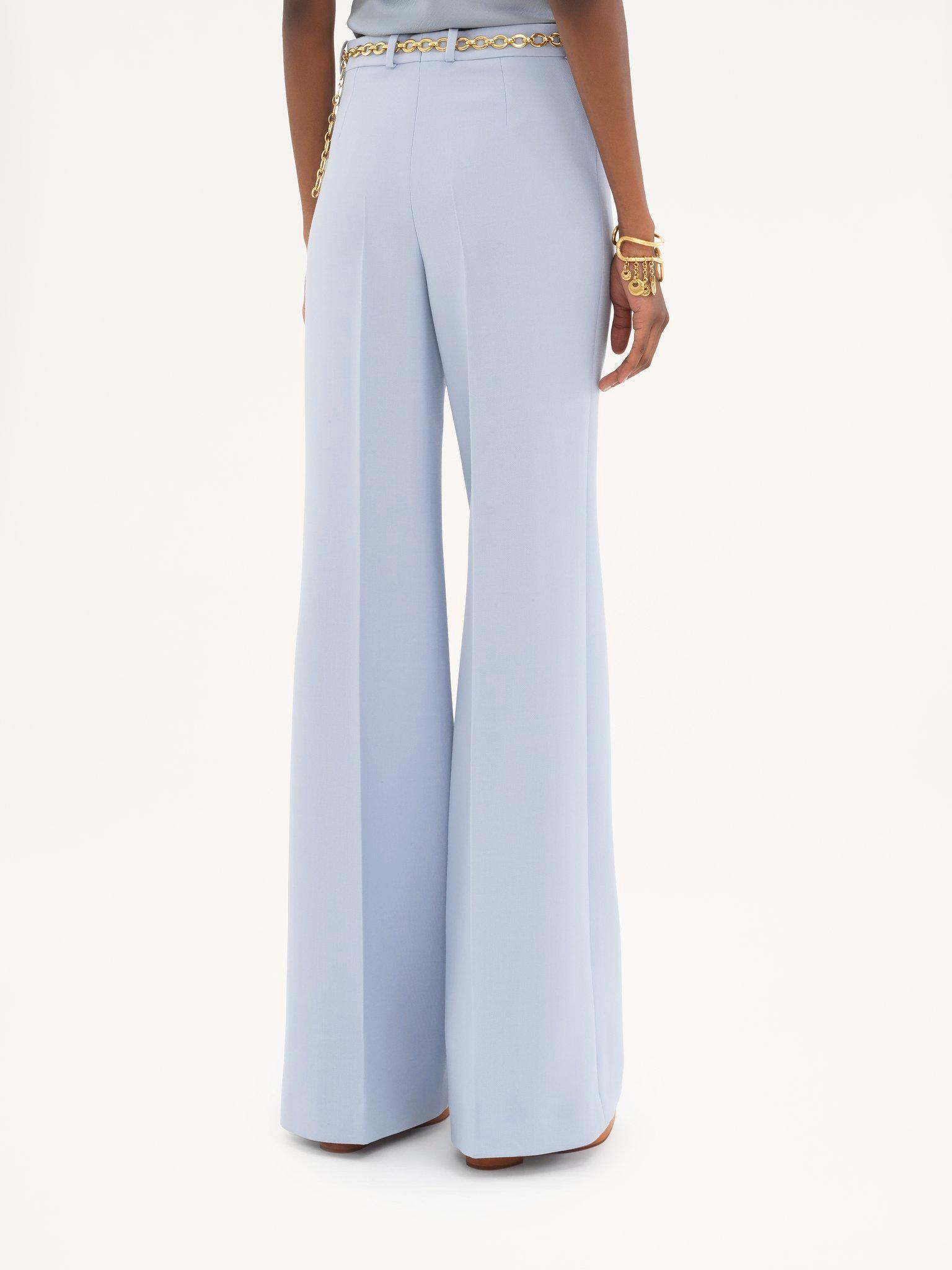 Flared tailored pants in wool crêpe Product Image