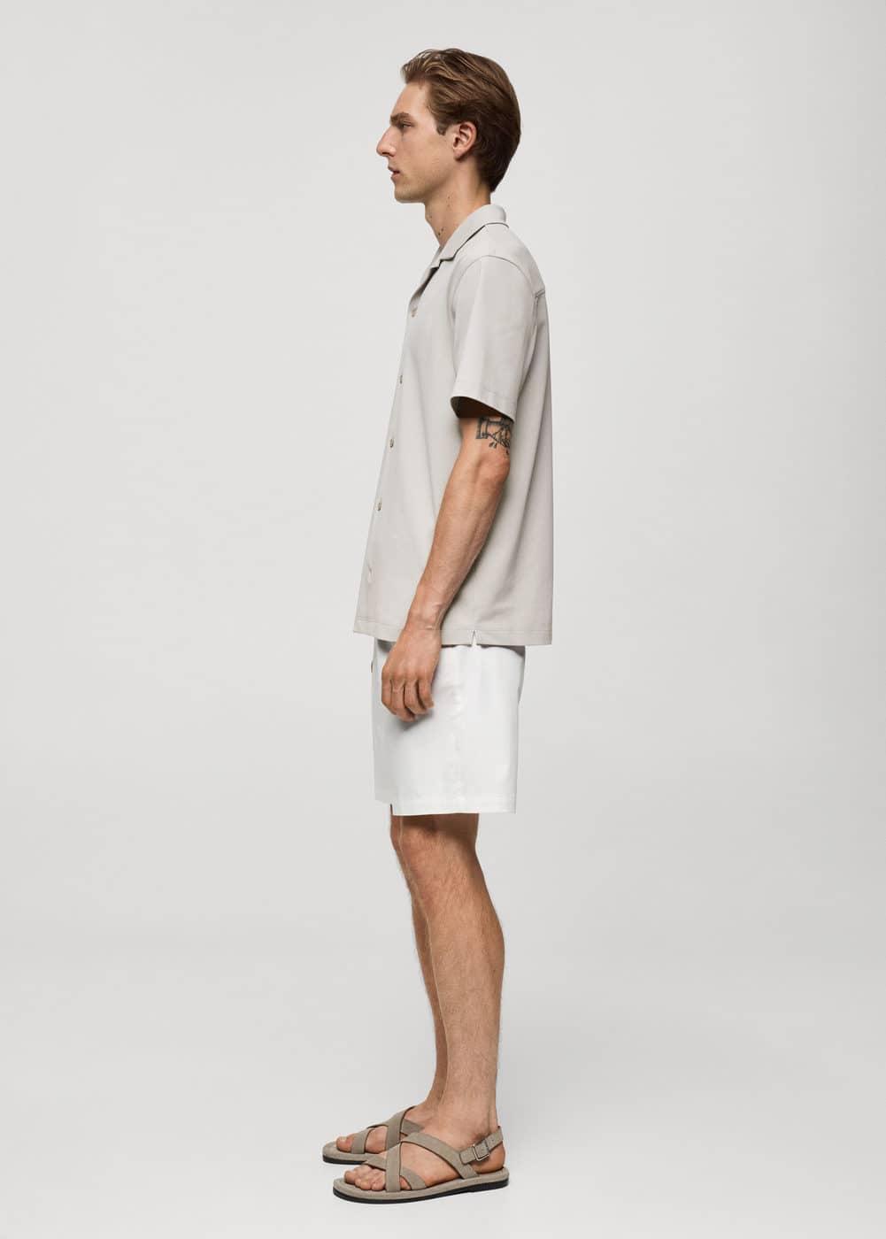 Short sleeved cotton shirt - Men | MANGO USA Product Image