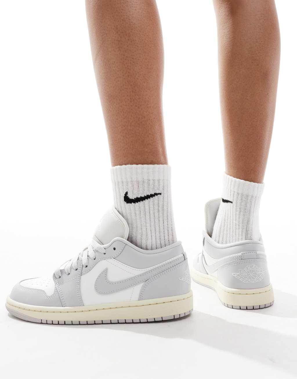 Nike Air Jordan 1 Low sneakers in white and gray  Product Image