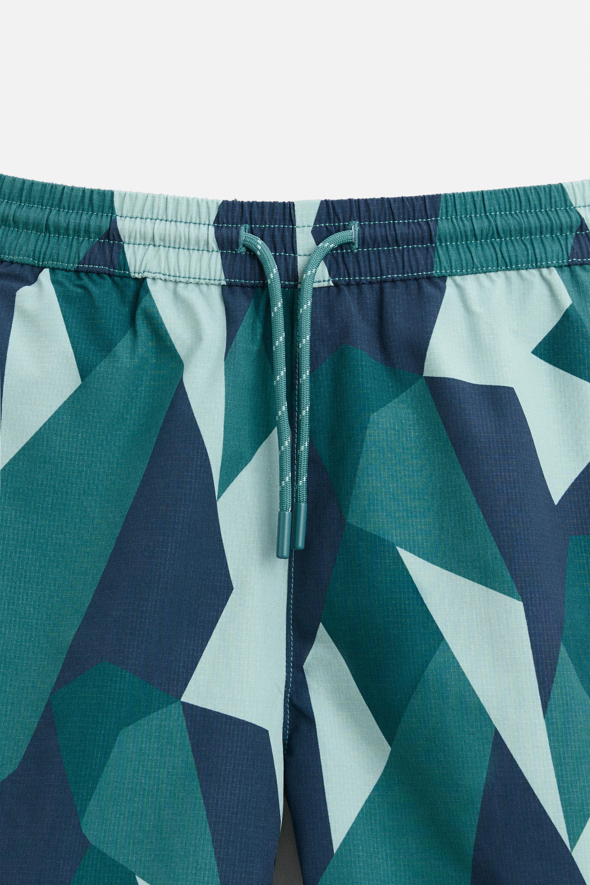 LONG ABSTRACT PRINTED SWIMMING TRUNKS Product Image