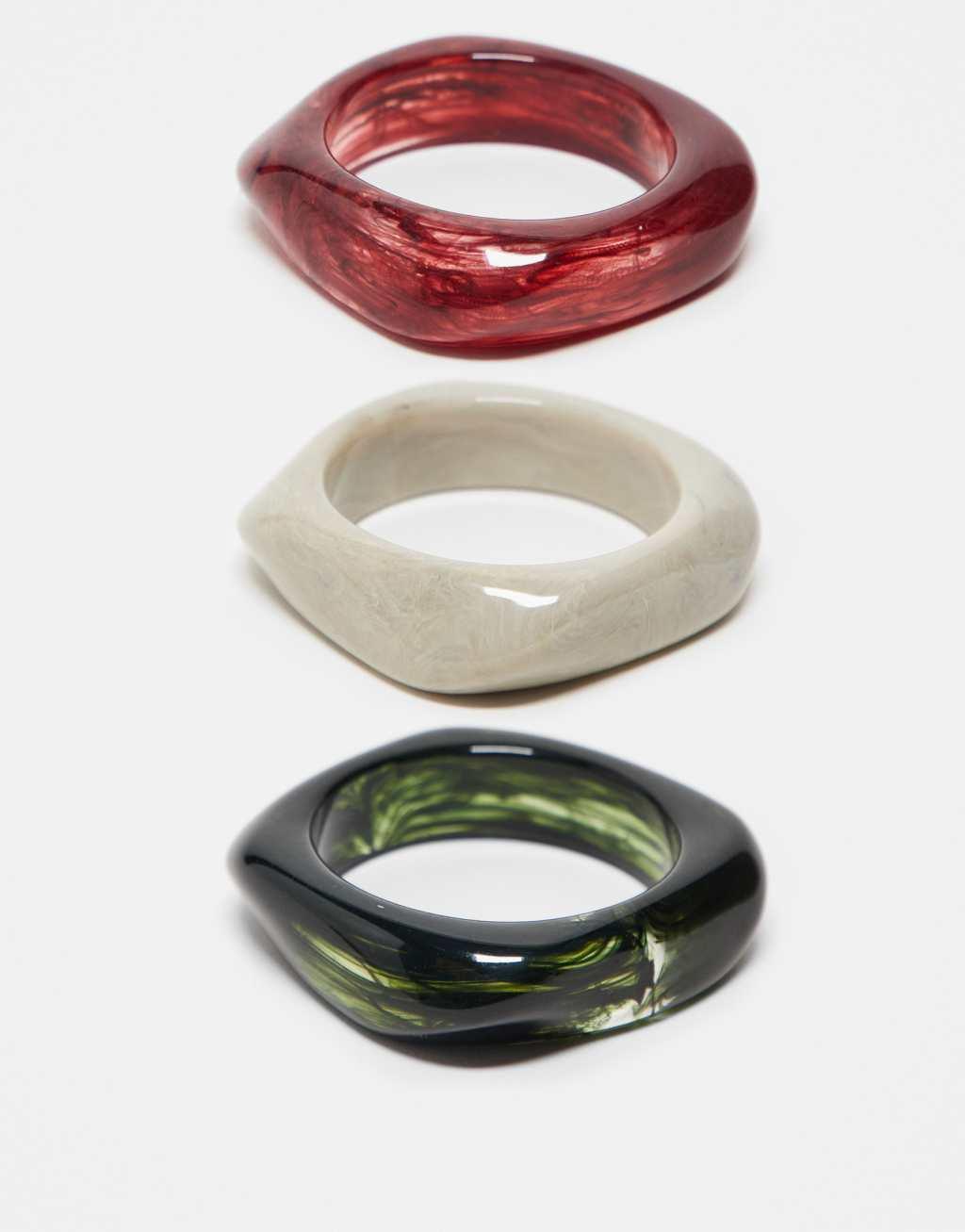 ASOS DESIGN pack of 3 resin bangles in burgundy and green Product Image