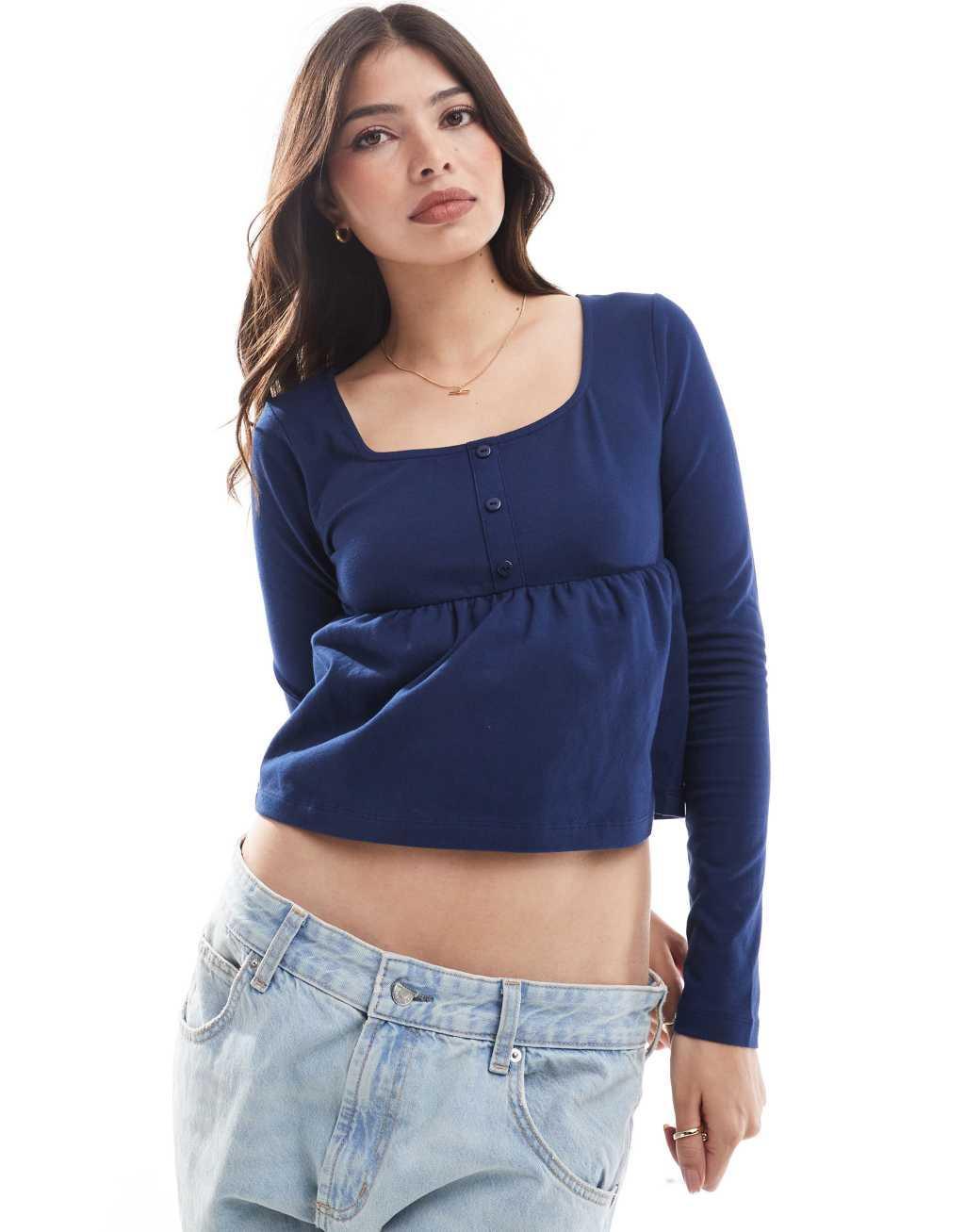 ASOS DESIGN babydoll long sleeve henley top in navy Product Image