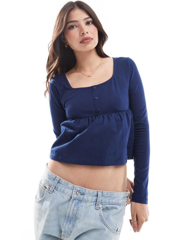 ASOS DESIGN babydoll long sleeve henley top in navy Product Image