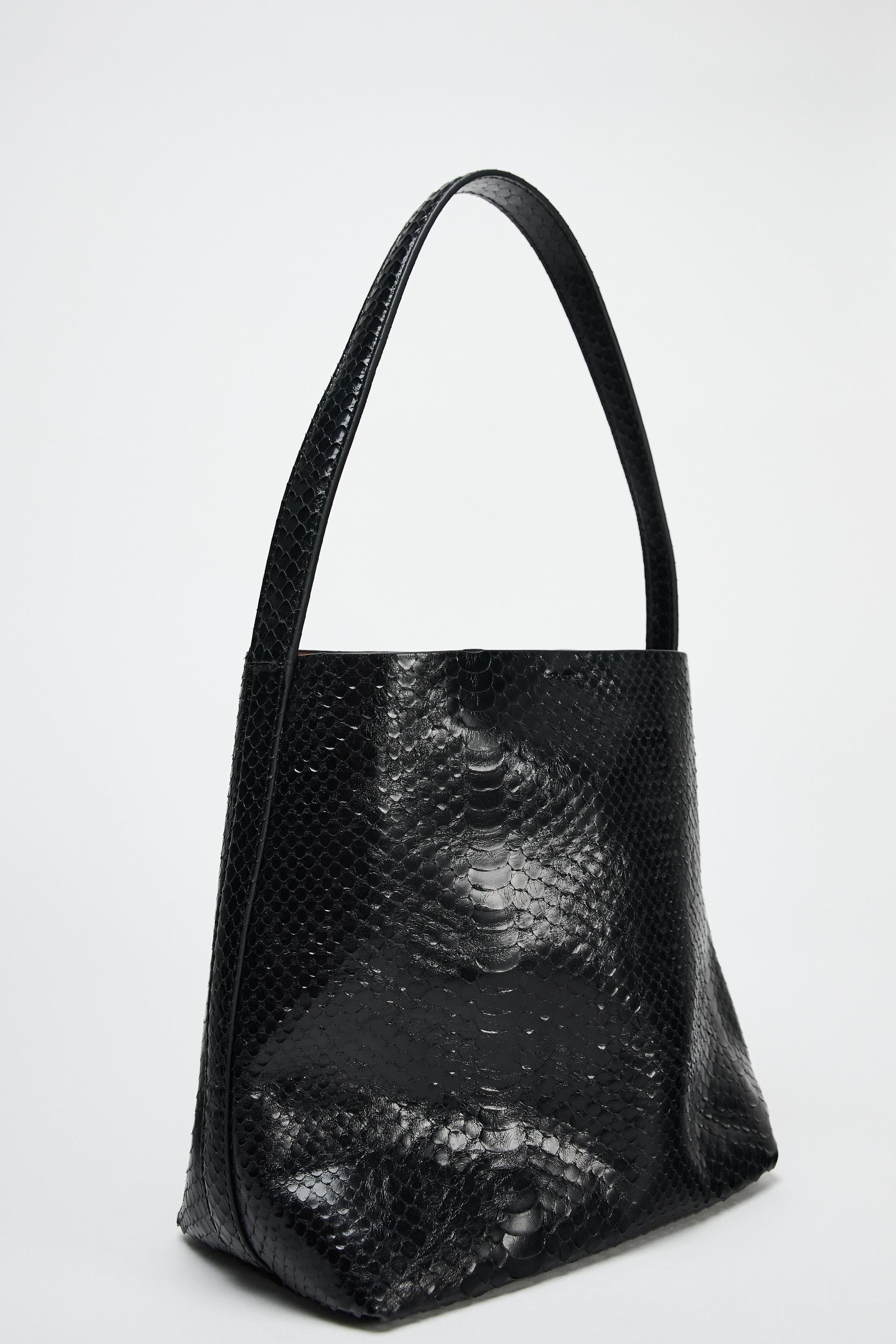 EMBOSSED LEATHER BUCKET BAG Product Image