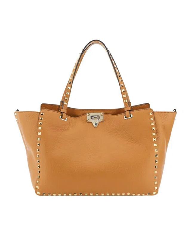 VALENTINO GARAVANI Rockstud Medium Top Handle Bag In Brown Product Image