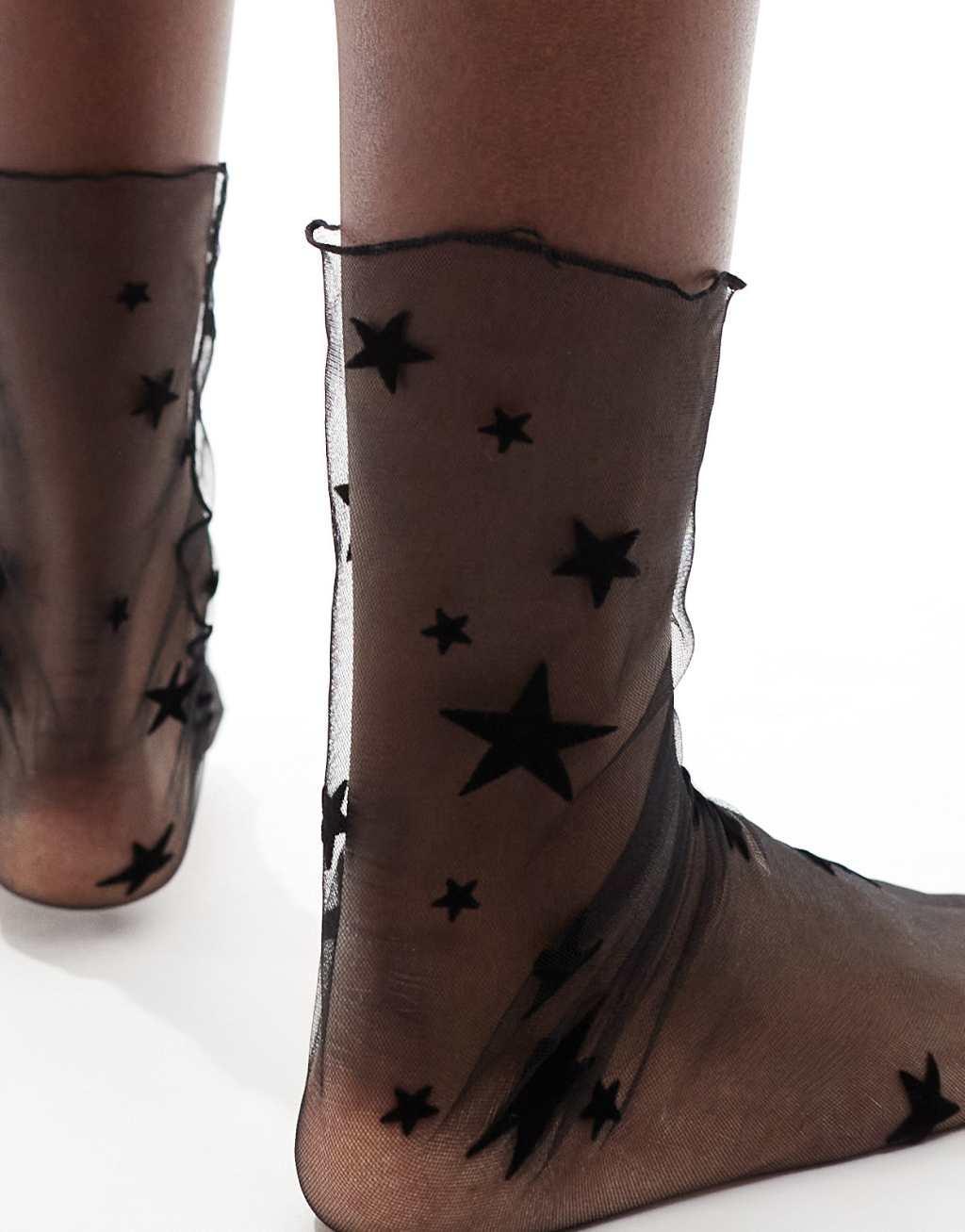 Glamorous mesh star print socks in black  Product Image