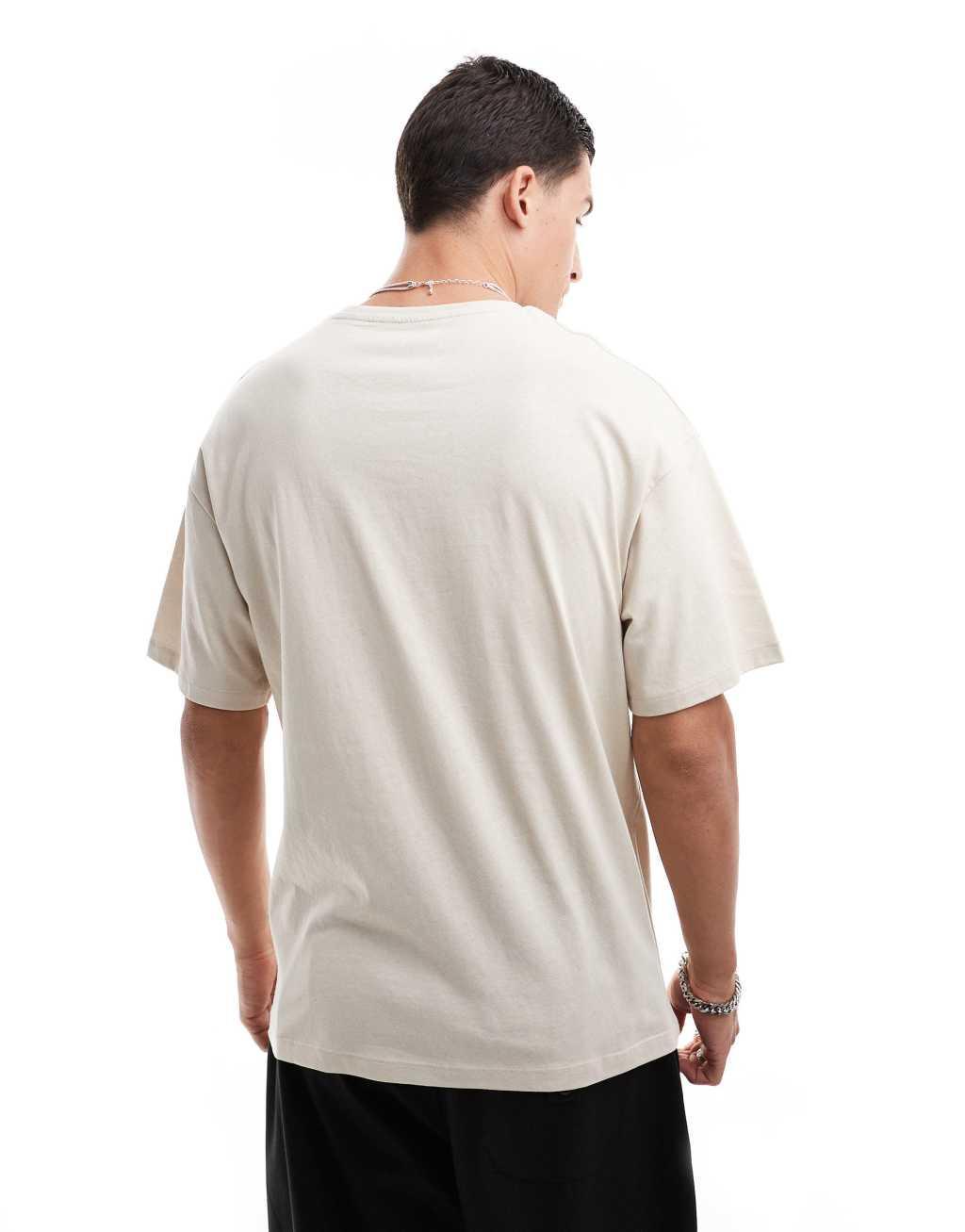 Jack & Jones oversized T-shirt with crane chest print in beige Product Image